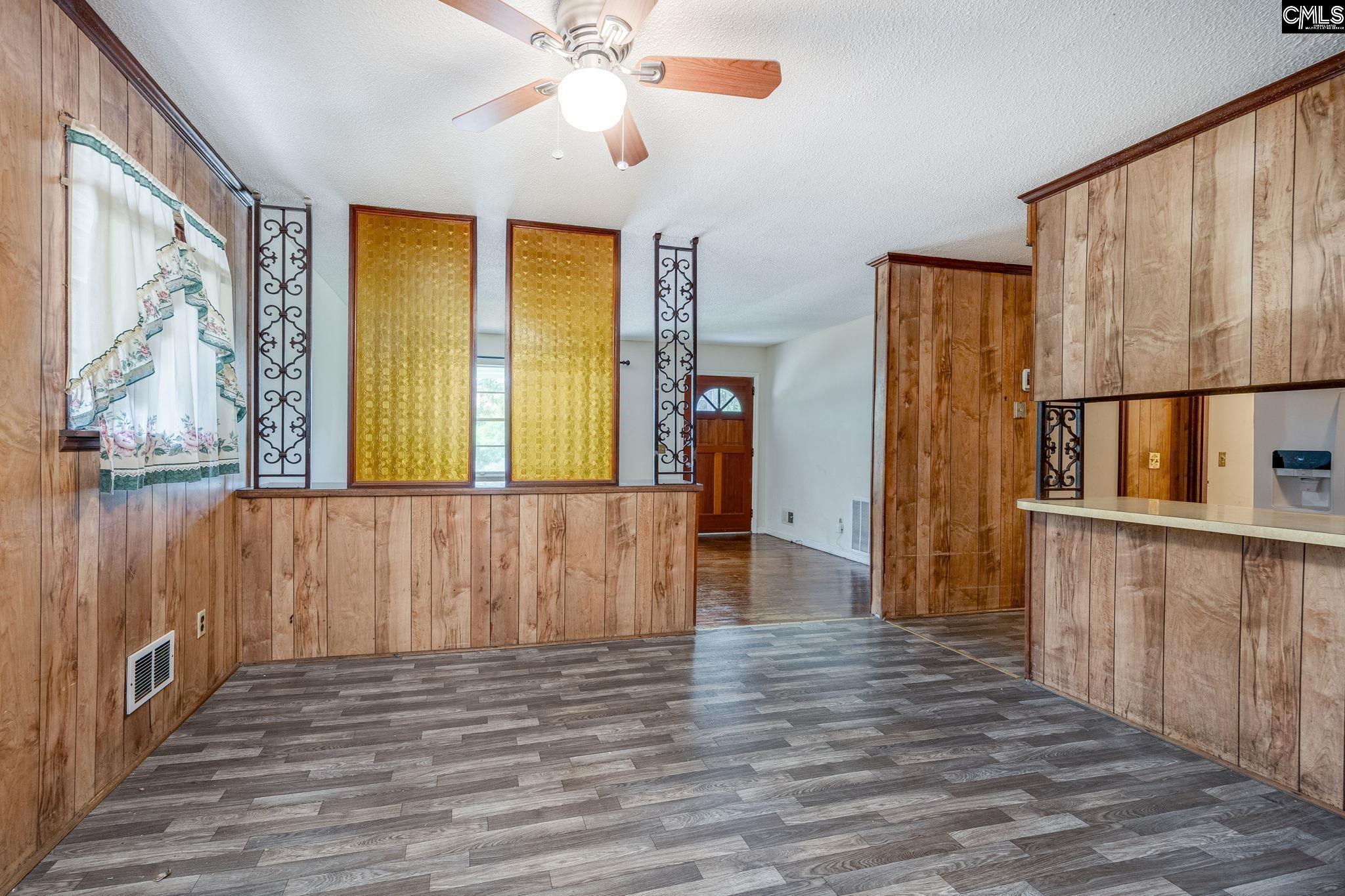 5666 Middleton Court Columbia, SC 29203 - Photo 14 of 42 a view of hallway with wooden floor and door