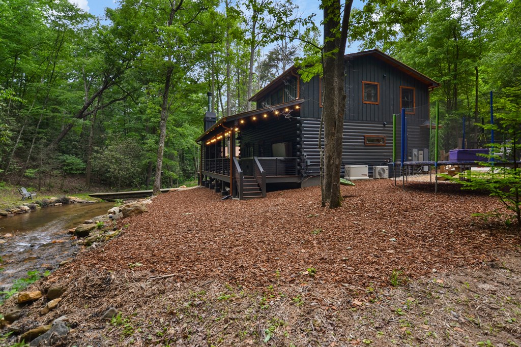 17 Emmaus Walk Blue Ridge, GA 30513 - Photo 48 of 59 a view of a house with backyard and sitting area