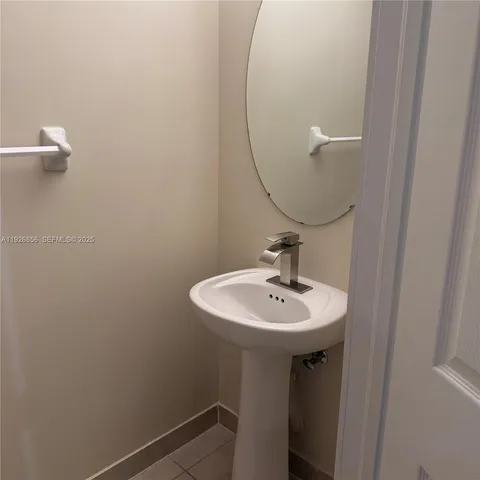 a view of backyard with tub