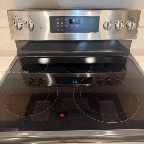a refrigerator freezer sitting in a kitchen