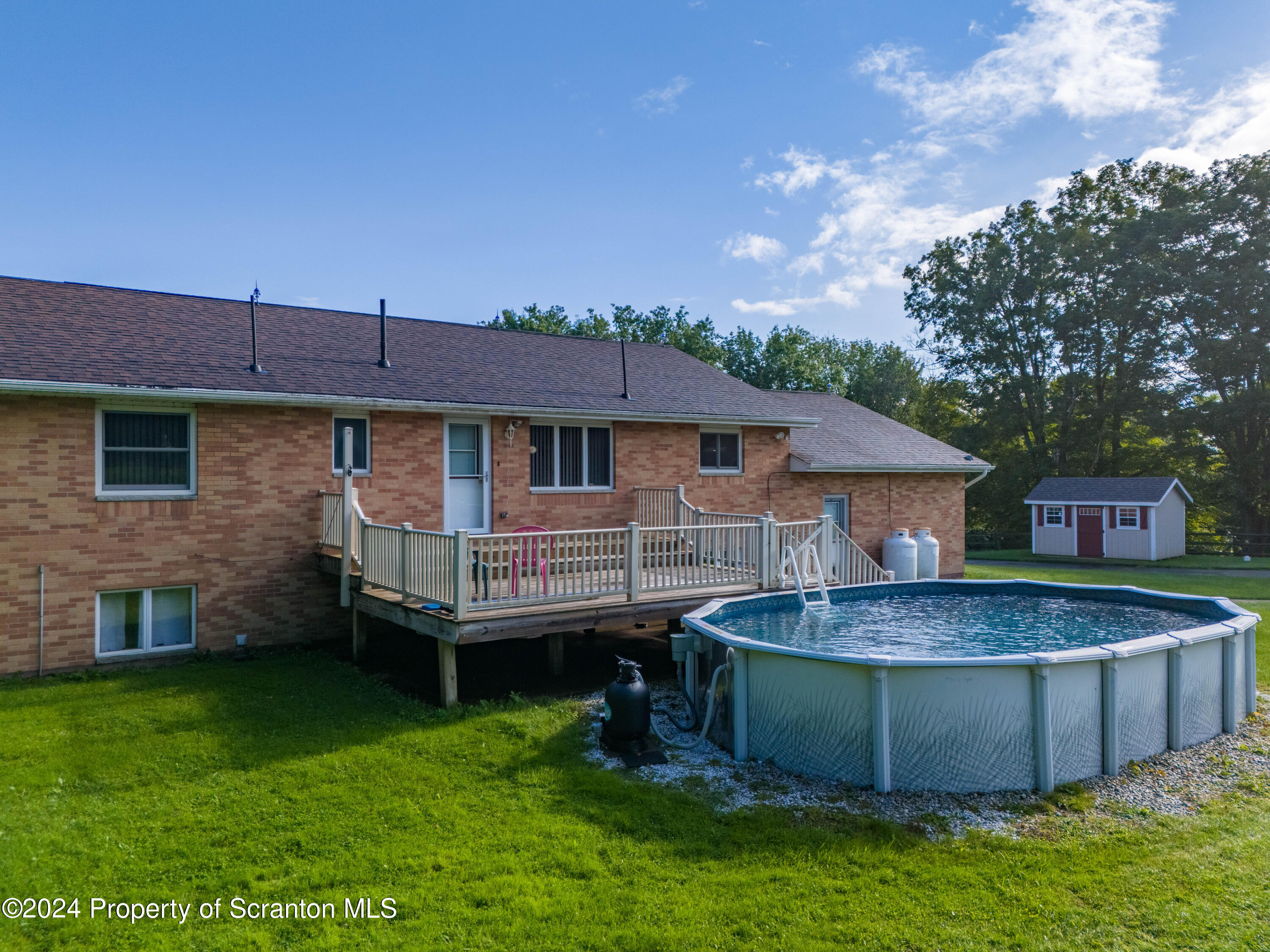 6509 State Rte 2012 Union Dale, PA 18470 - Photo 2 of 91 a view of a house with a backyard and swimming pool