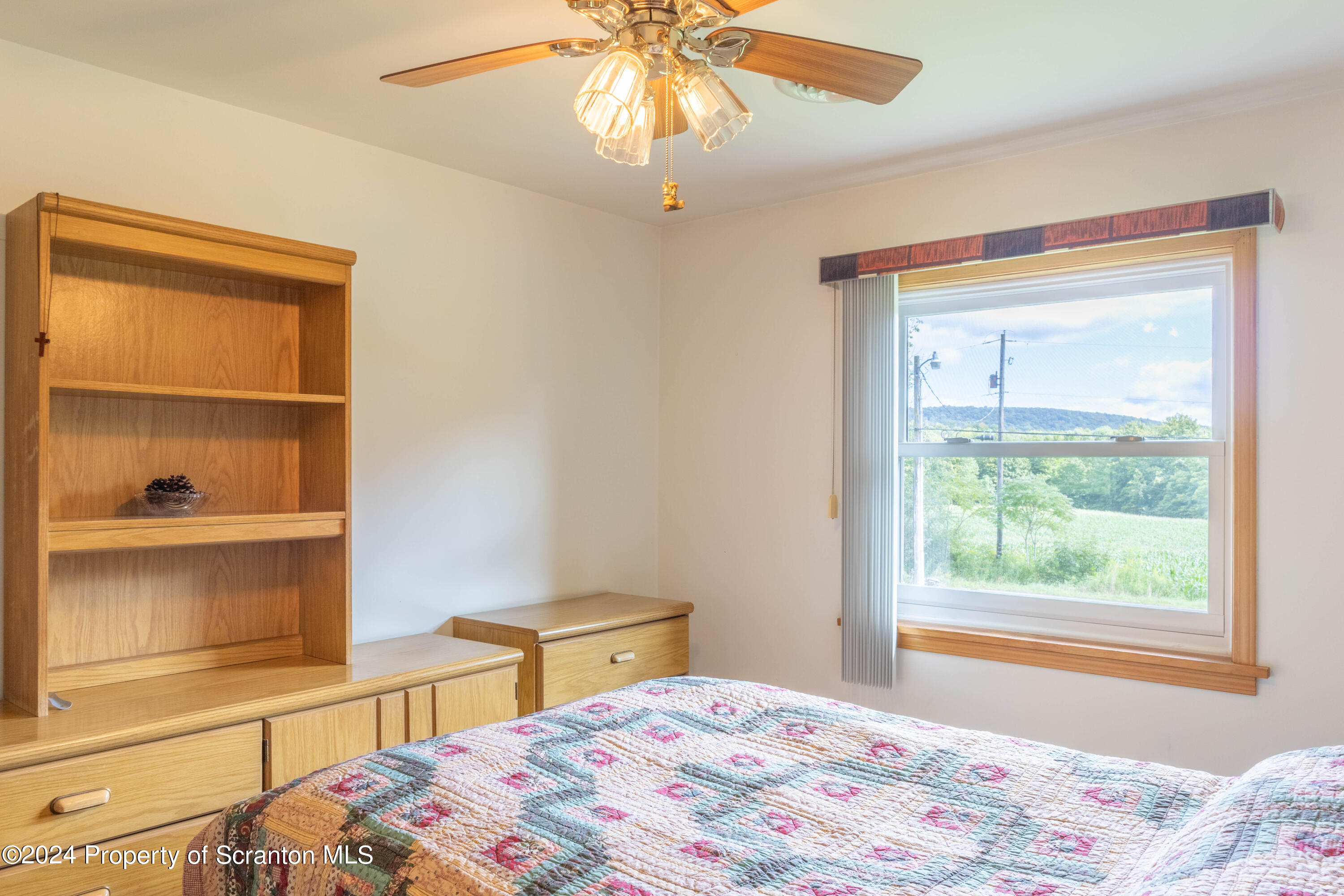 6509 State Rte 2012 Union Dale, PA 18470 - Photo 23 of 91 a bedroom with a bed and a window