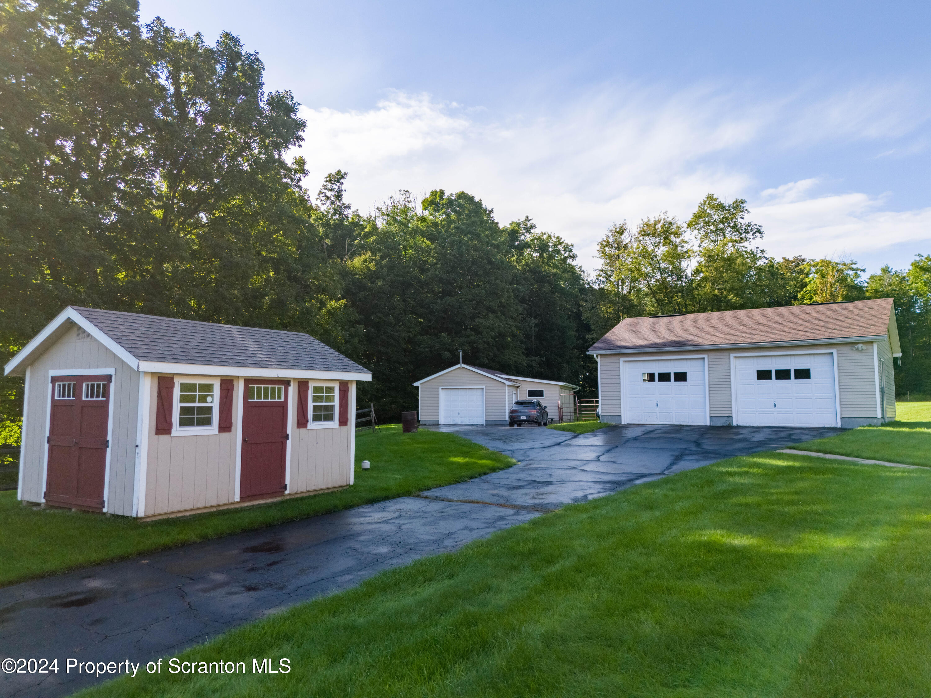 6509 State Rte 2012 Union Dale, PA 18470 - Photo 3 of 91 a view of a yard in front of a house with large tree