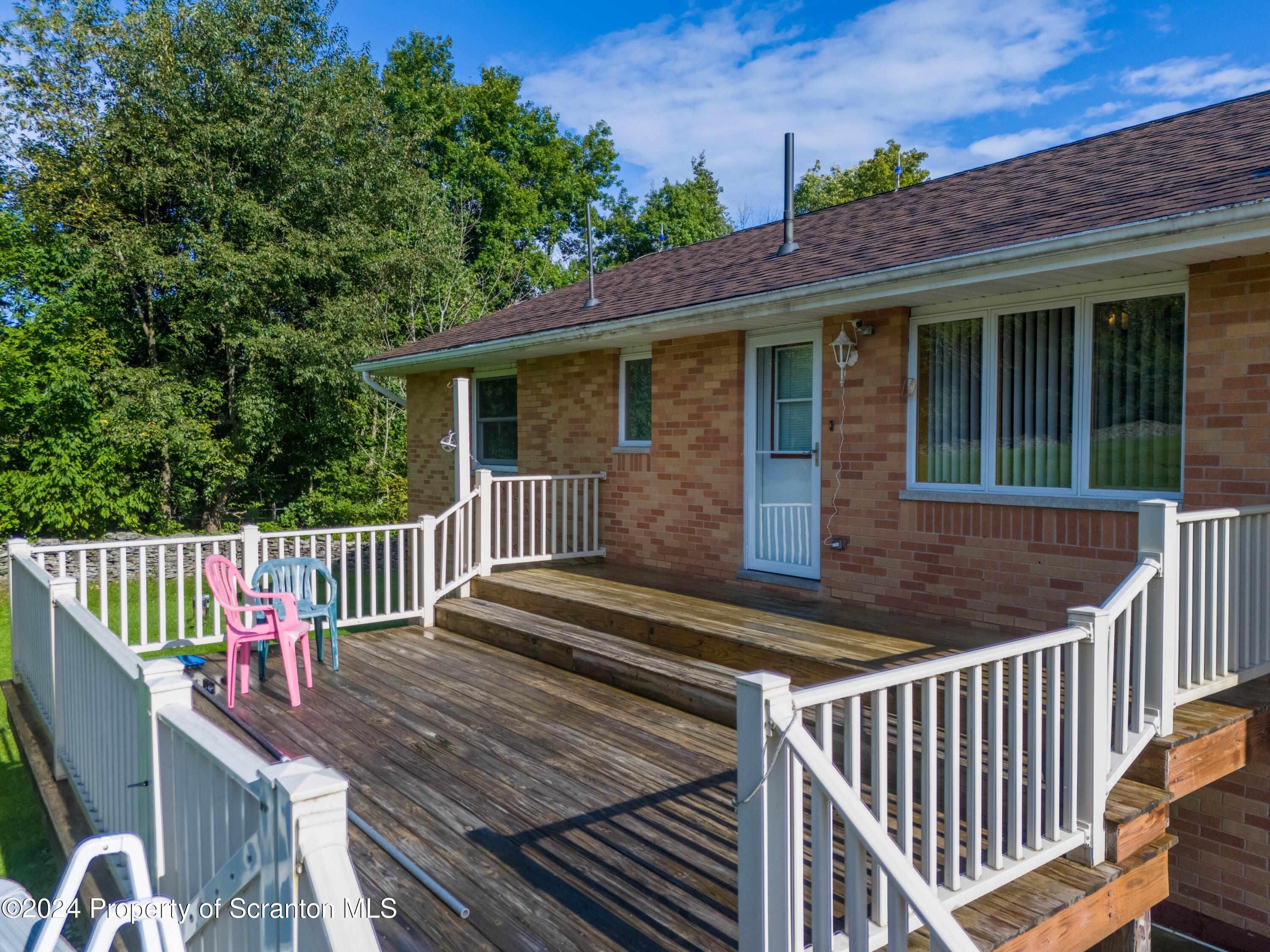 6509 State Rte 2012 Union Dale, PA 18470 - Photo 36 of 91 a view of a wooden deck and a yard