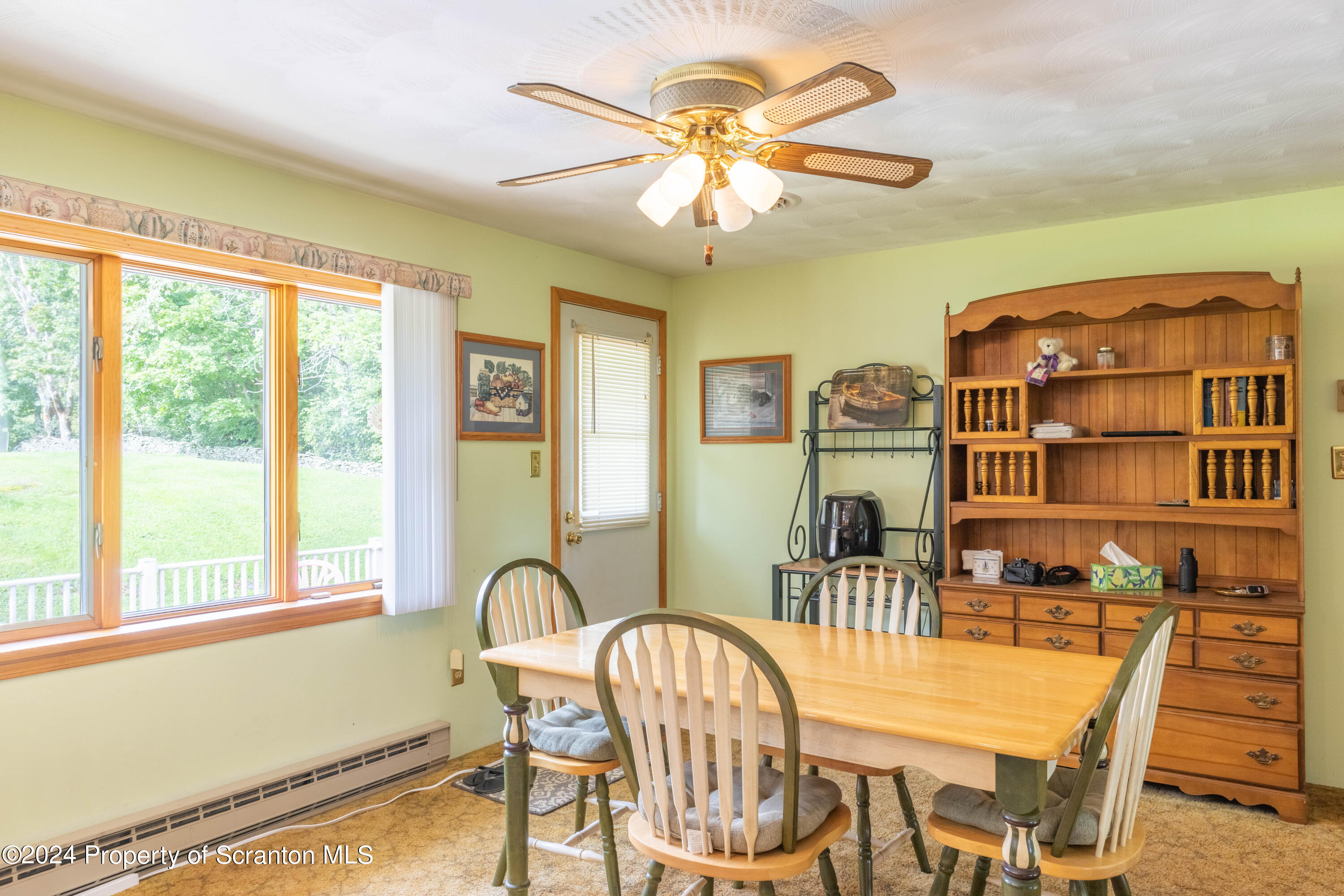 6509 State Rte 2012 Union Dale, PA 18470 - Photo 4 of 91 a dining room with furniture and window