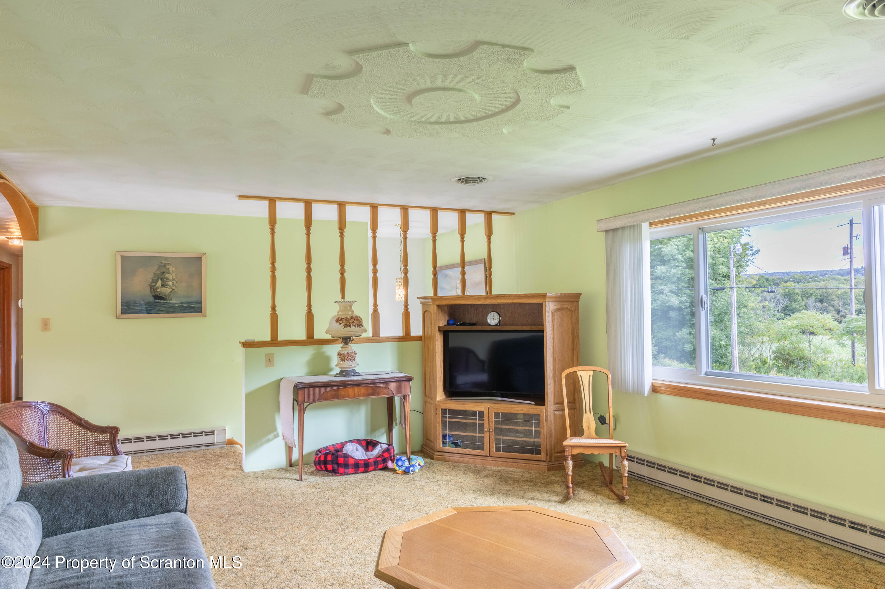 6509 State Rte 2012 Union Dale, PA 18470 - Photo 65 of 91 a bedroom with furniture and a large window