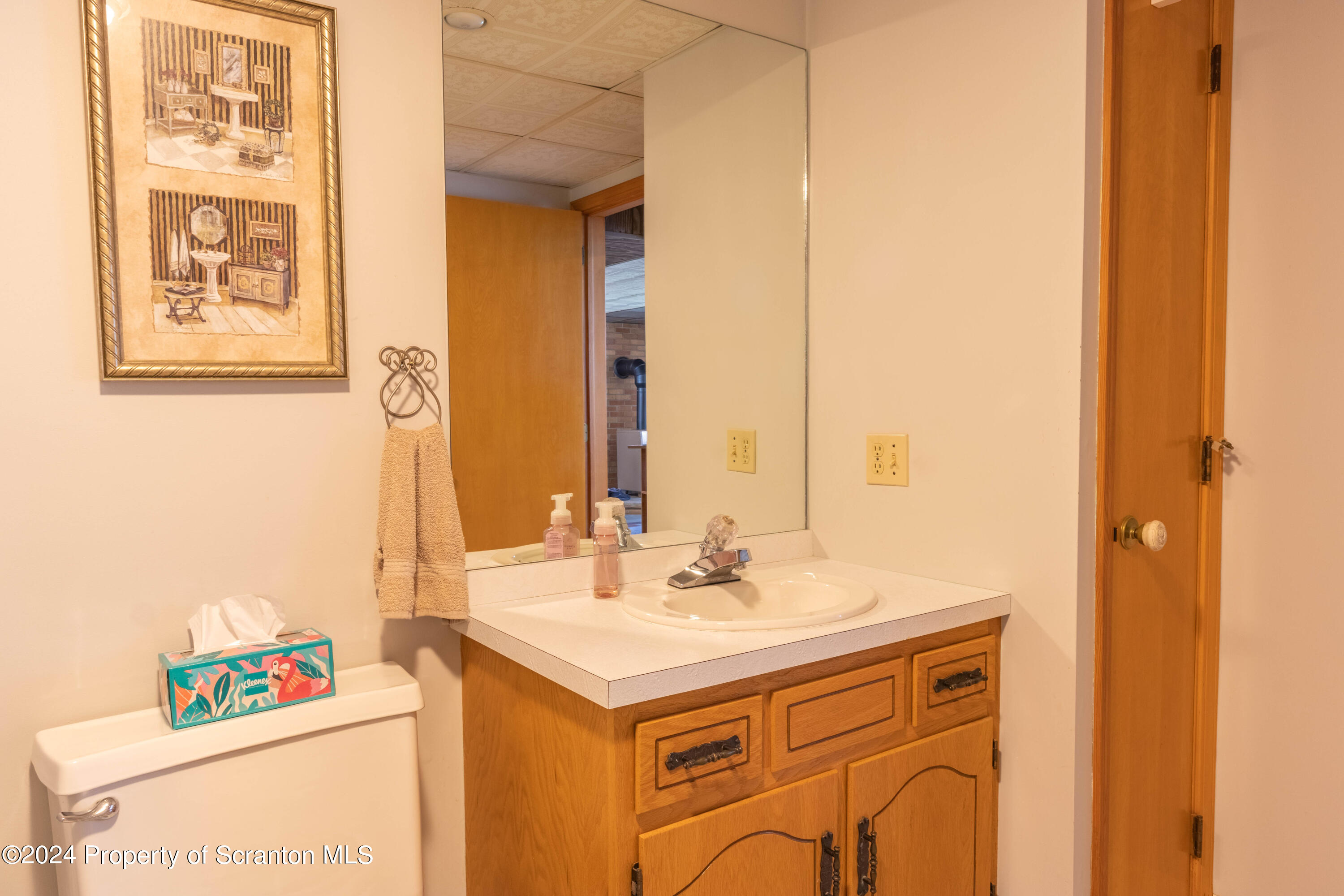 6509 State Rte 2012 Union Dale, PA 18470 - Photo 67 of 91 a bathroom with a sink and a mirror