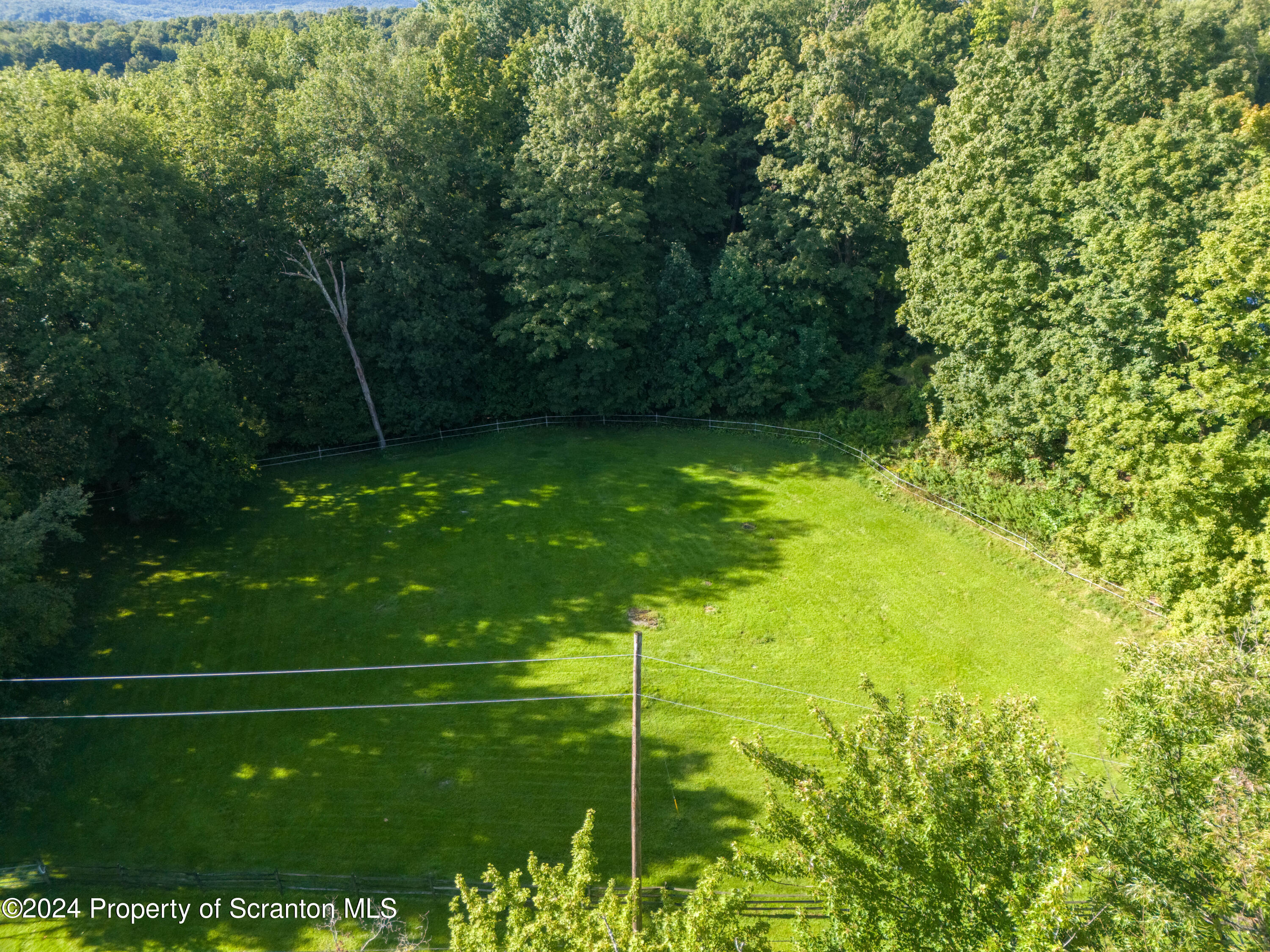 6509 State Rte 2012 Union Dale, PA 18470 - Photo 78 of 91 a backyard of a house with lots of green space