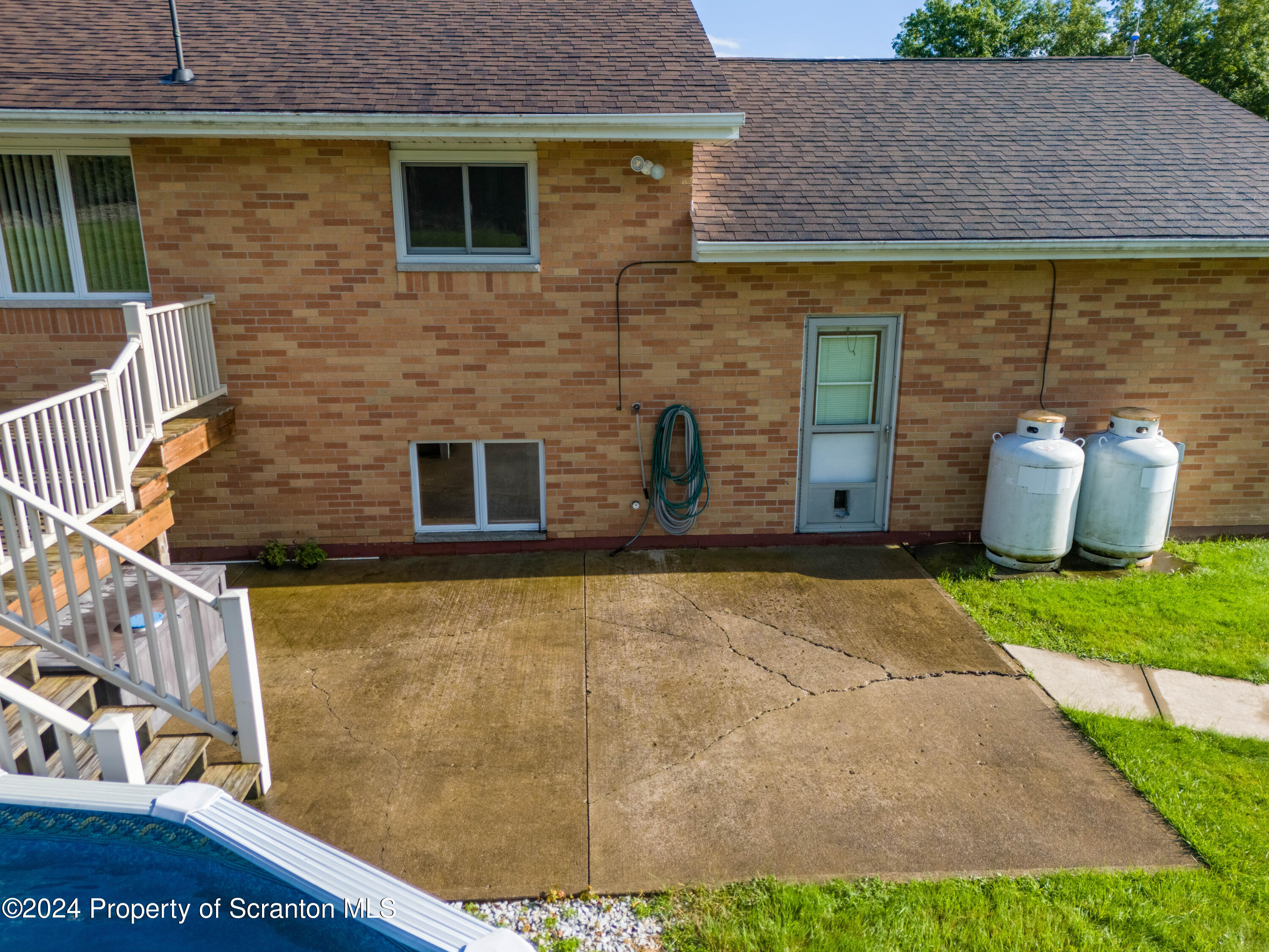 6509 State Rte 2012 Union Dale, PA 18470 - Photo 82 of 91 a brick house with a outdoor space