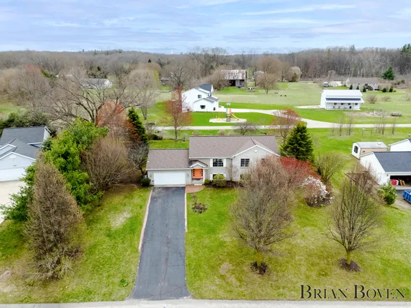 $450,000 | 7631 Hessler Drive Northeast, Rockford, MI 49341