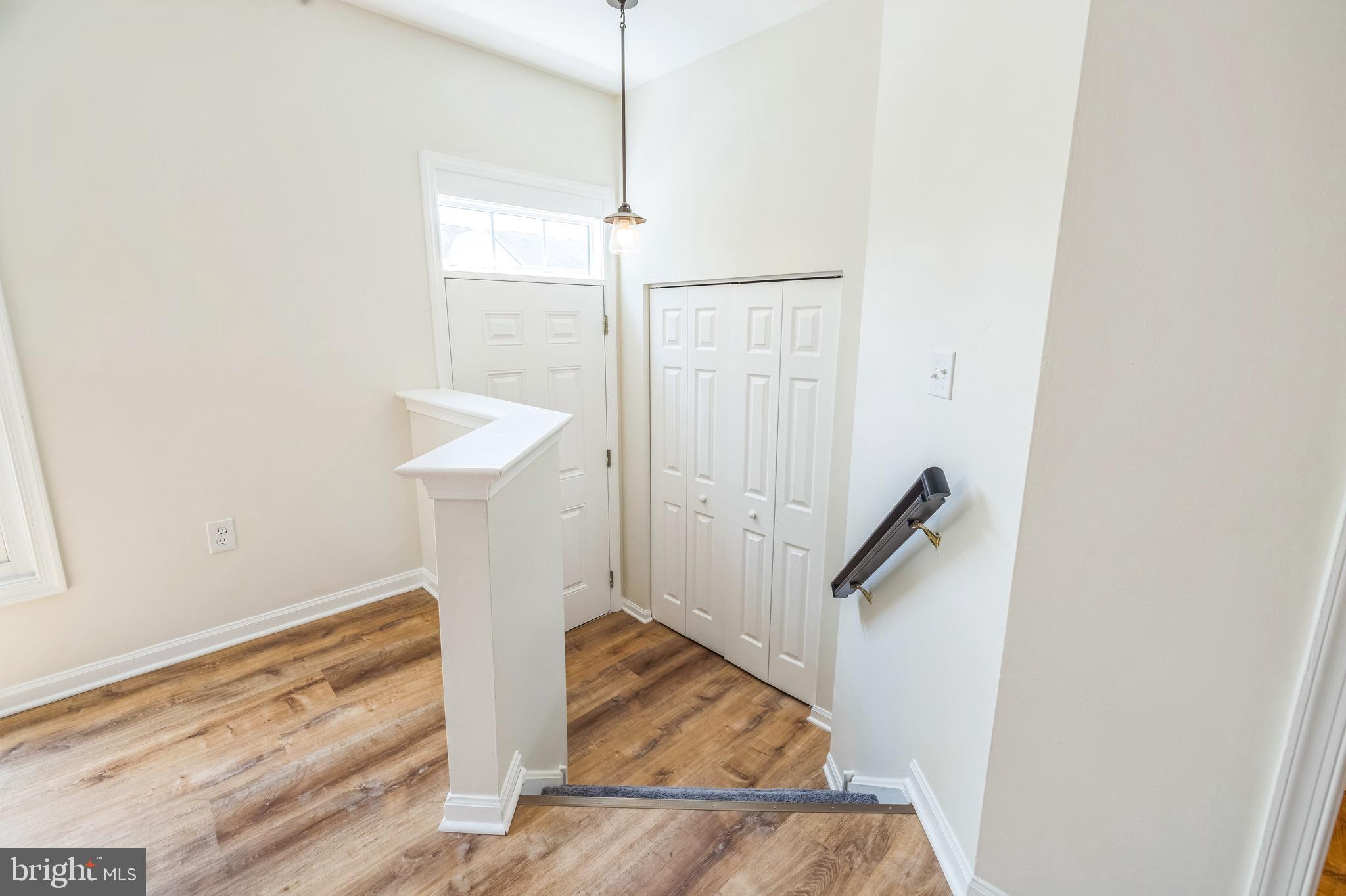 8 Versailles Court Newark, DE 19702 - Photo 14 of 30 a view of entryway with wooden floor
