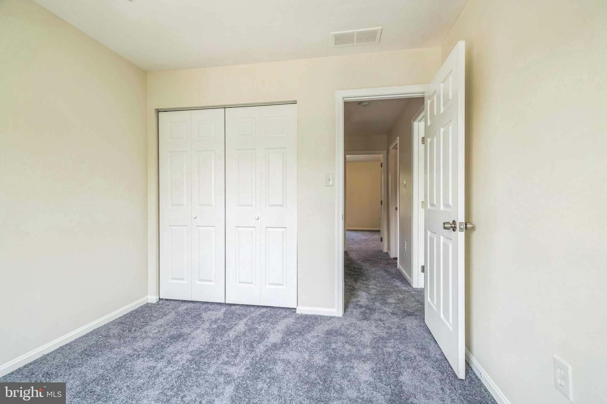 8 Versailles Court Newark, DE 19702 - Photo 7 of 30 an empty room with closet