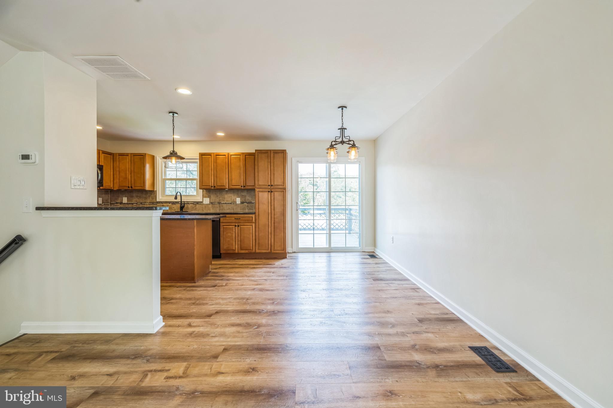 8 Versailles Court Newark, DE 19702 - Photo 10 of 30 a view of kitchen with wooden floor