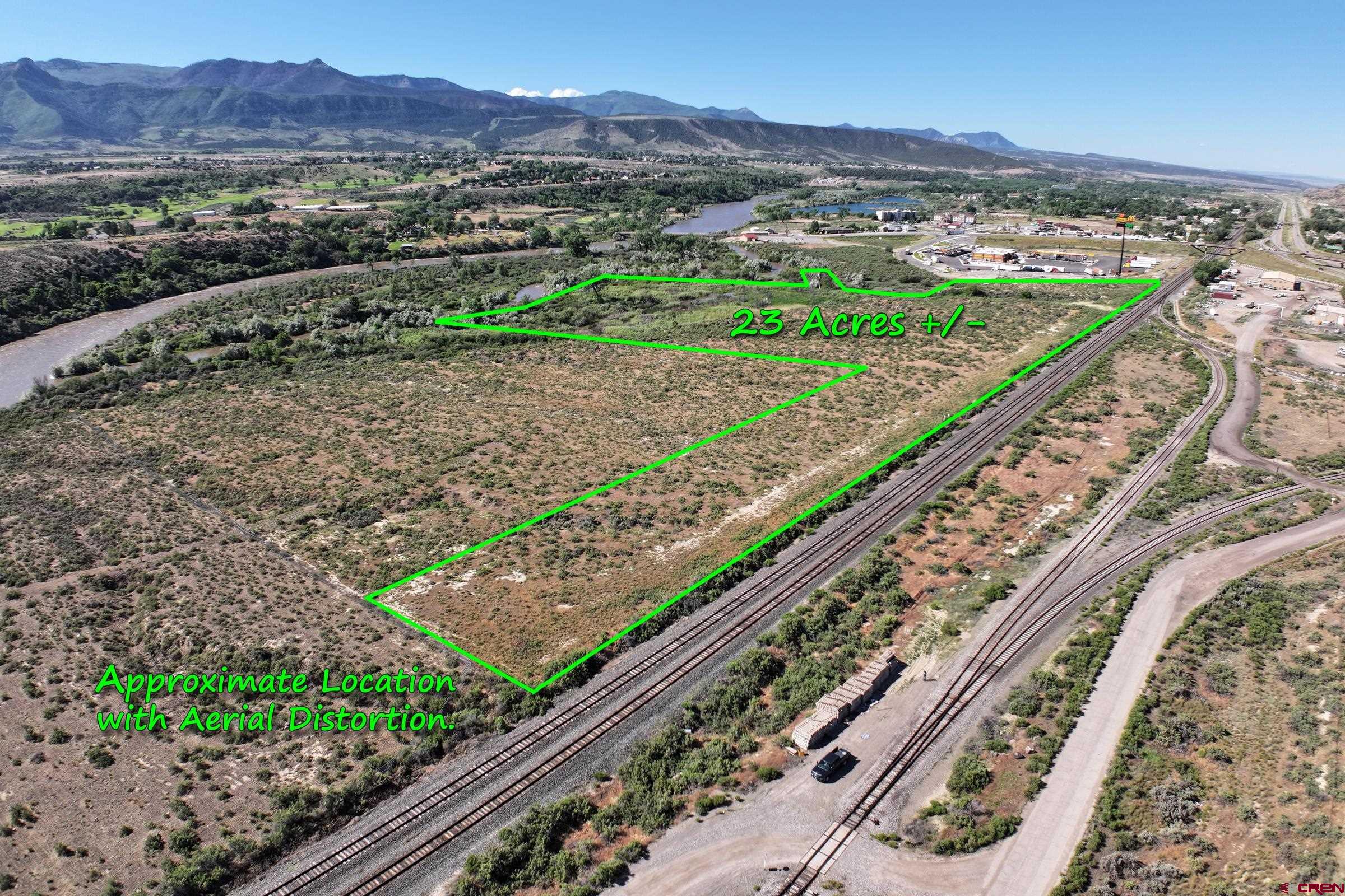 Tbd Tbd Tbd Parachute, CO 81635 - Photo 4 of 11 a view of a city with a mountain
