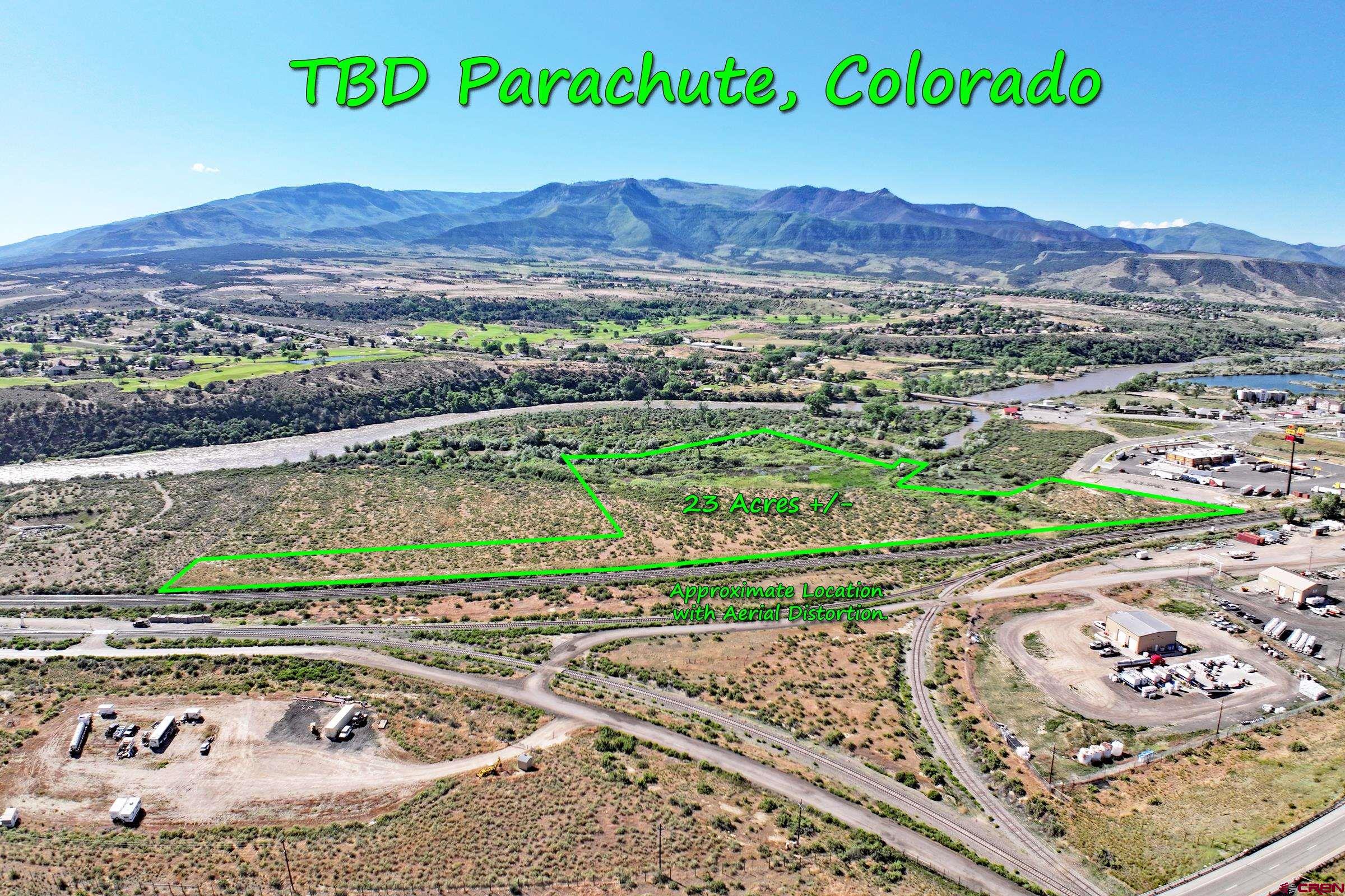 Tbd Tbd Tbd Parachute, CO 81635 - Photo 6 of 11 a view of a garden with a lake