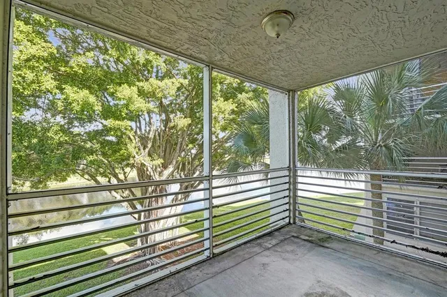 a view of a room with a large window