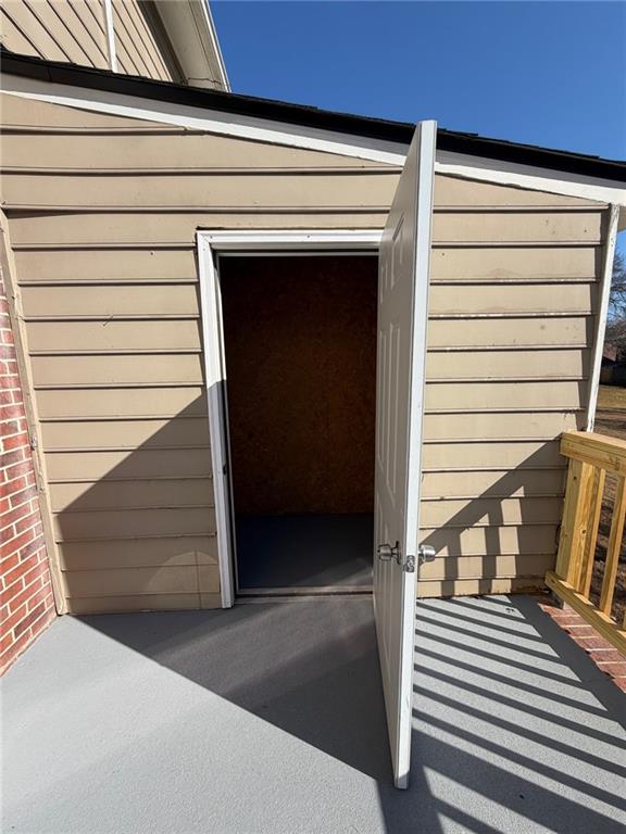 2250 Kings Gate Circle Southwest, Unit B Snellville, GA 30078 - Photo 29 of 31 a view of a entryway door of the house
