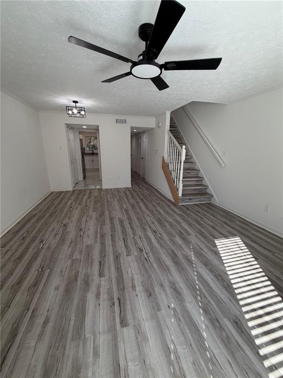 2250 Kings Gate Circle Southwest, Unit B Snellville, GA 30078 - Photo 3 of 31 a view of entryway and hall with wooden floor