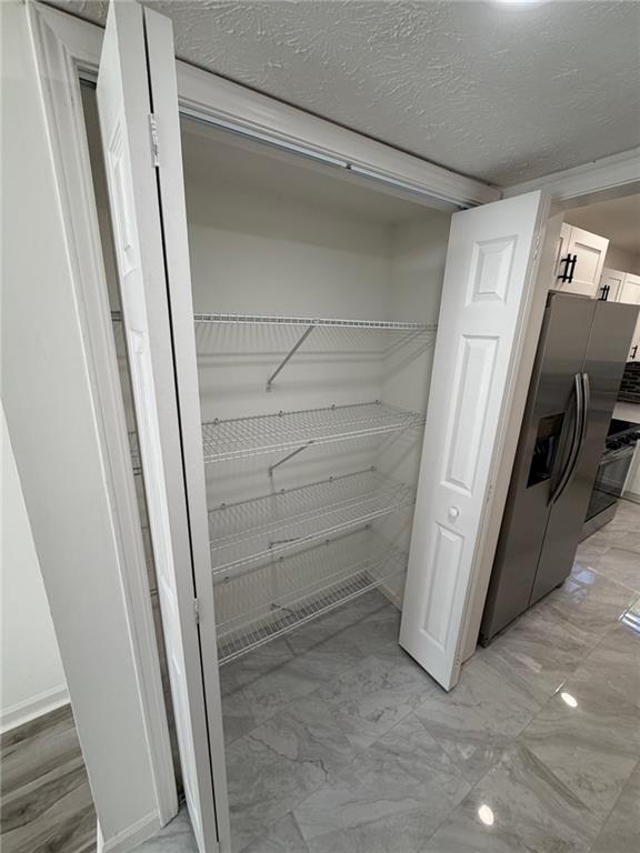 2250 Kings Gate Circle Southwest, Unit B Snellville, GA 30078 - Photo 7 of 31 a view of walk in closet