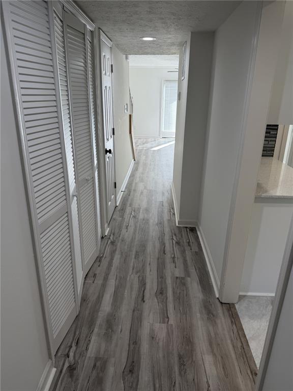 2250 Kings Gate Circle Southwest, Unit B Snellville, GA 30078 - Photo 9 of 31 a view of a room with wooden floor and staircase