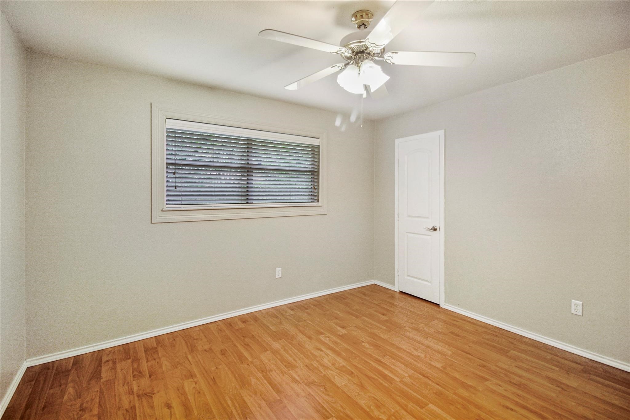 1915 East Allegro Street Houston, TX 77080 - Photo 6 of 13 a view of an empty room with a window