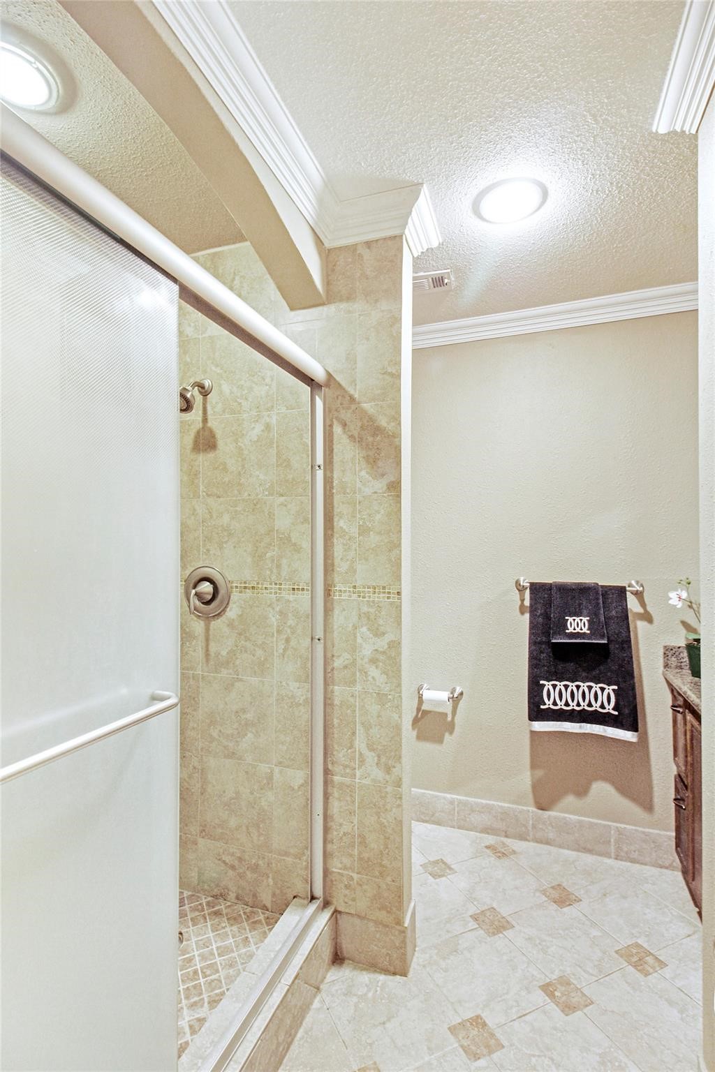 1915 East Allegro Street Houston, TX 77080 - Photo 9 of 13 a bathroom with a shower and a sink