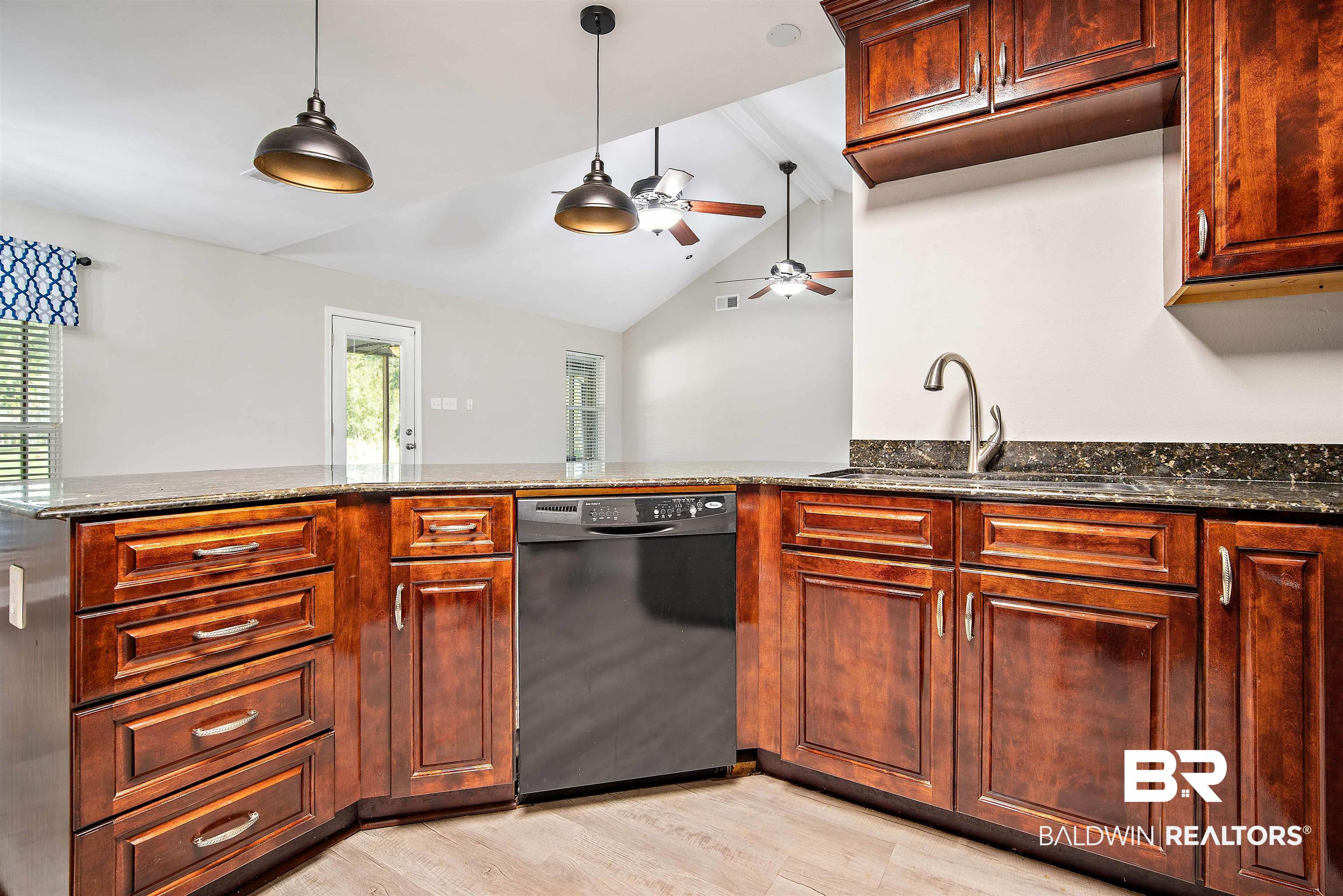 3010 Drag Strip Lane Coden, AL 36523 - Photo 12 of 44 Kitchen with light hardwood / wood-style floors, sink, ceiling fan, dishwasher, and lofted ceiling with beams