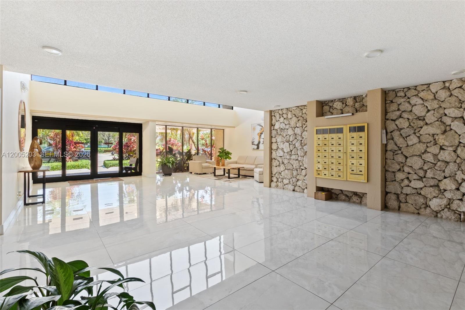 16400 Golf Club Road, Unit 104 Weston, FL 33326 - Photo 3 of 34 a view of livingroom with furniture