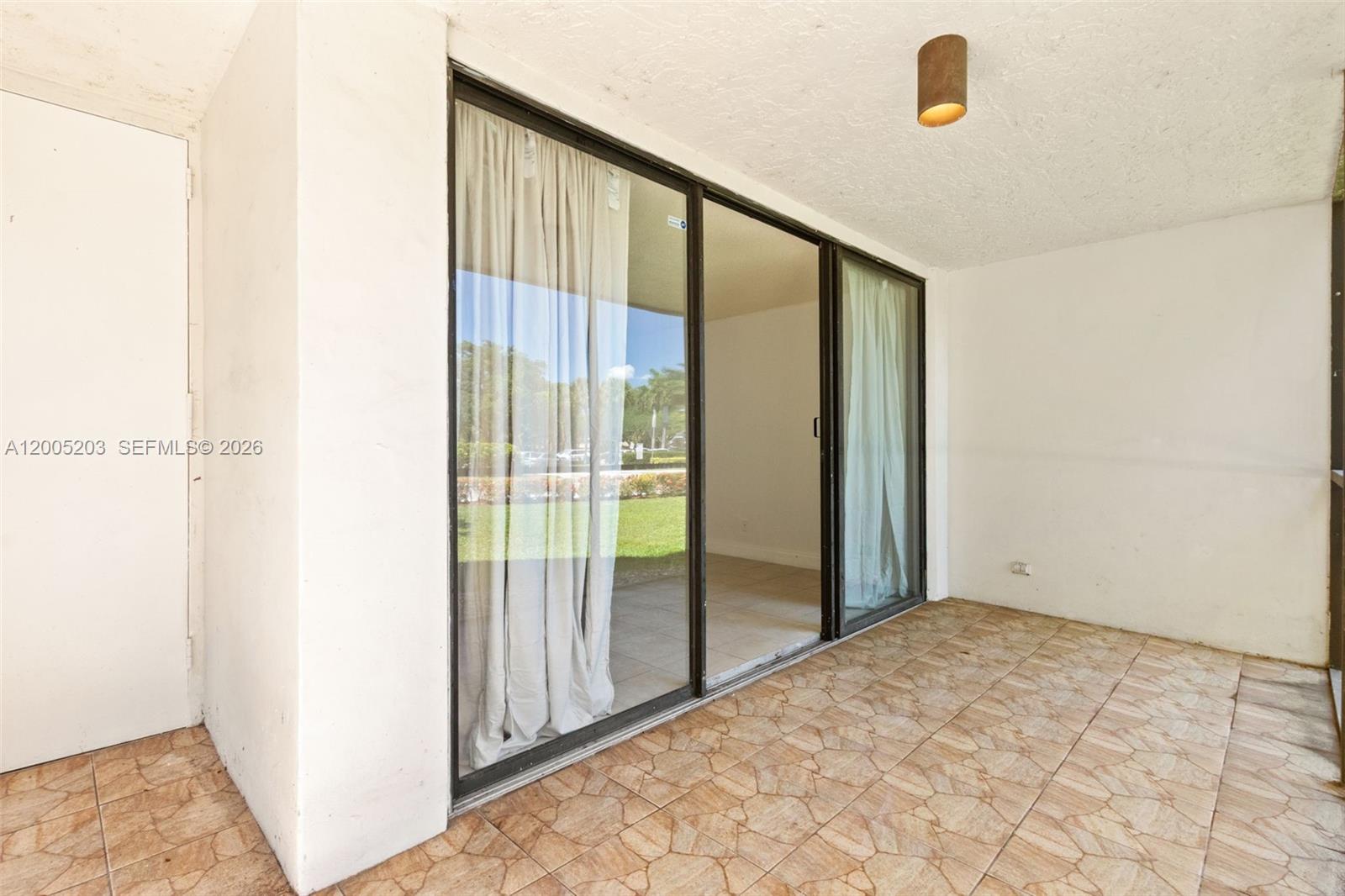 16400 Golf Club Road, Unit 104 Weston, FL 33326 - Photo 33 of 34 a view of an empty room