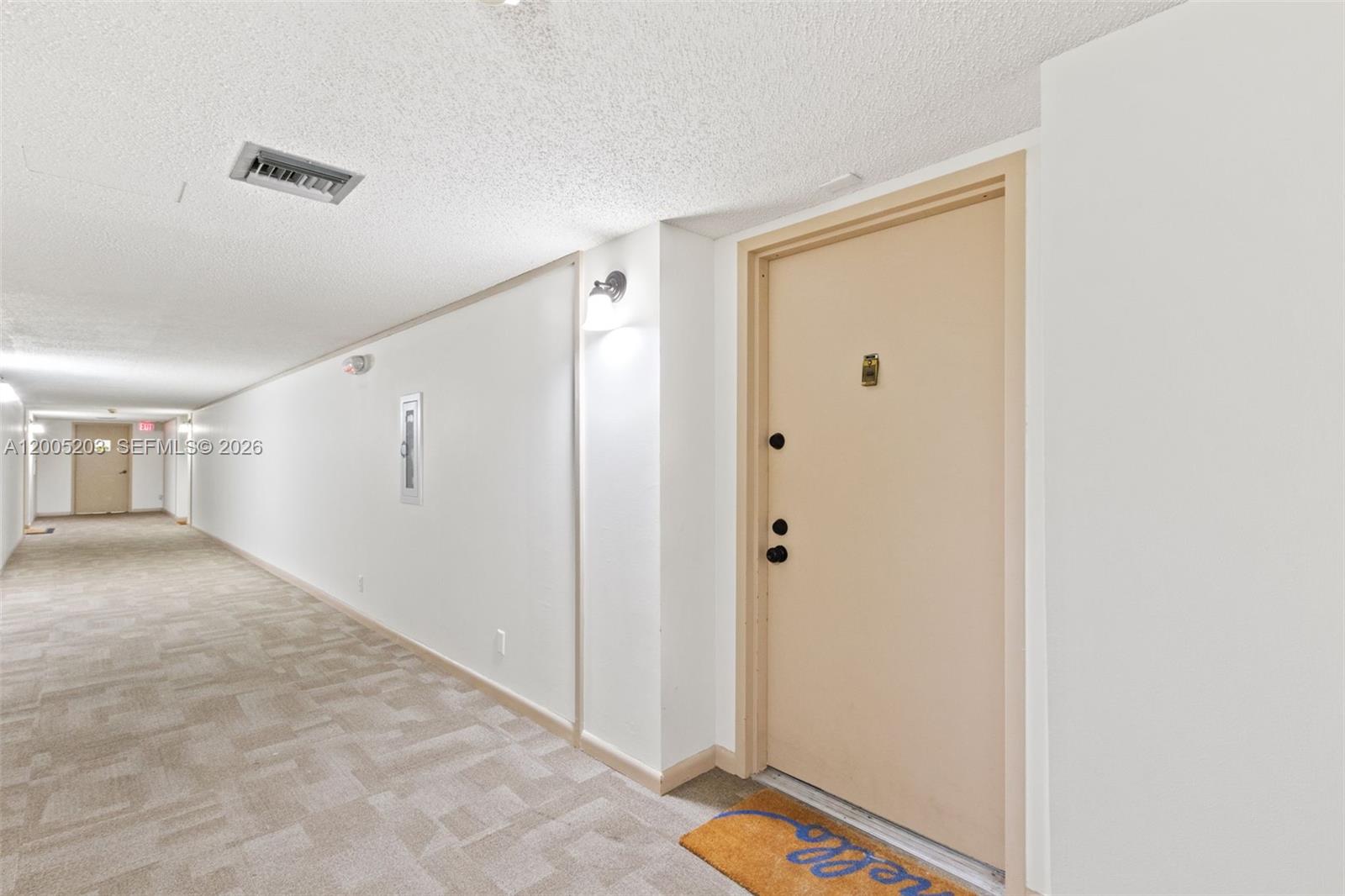 16400 Golf Club Road, Unit 104 Weston, FL 33326 - Photo 4 of 34 a view of a hallway with entryway