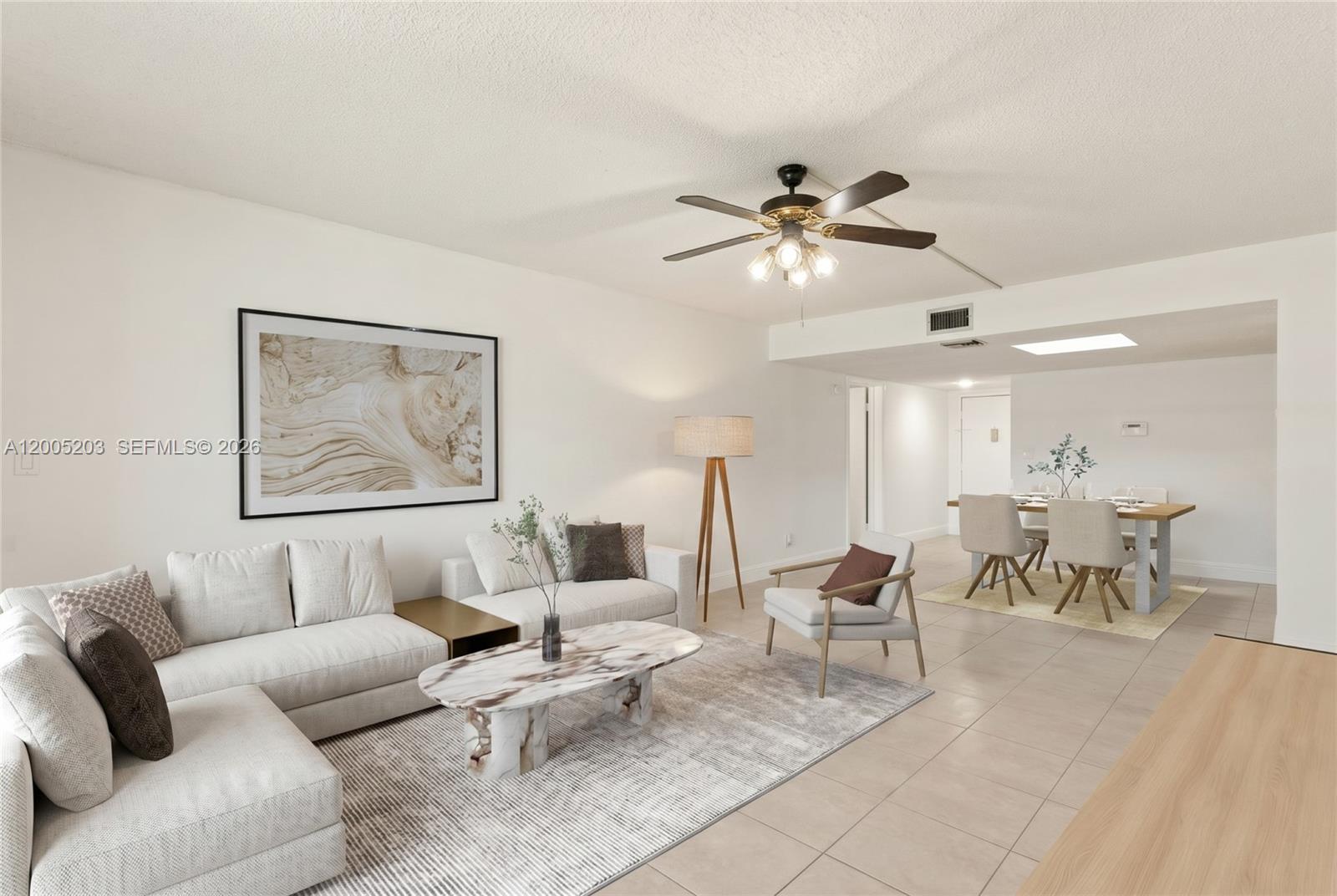 16400 Golf Club Road, Unit 104 Weston, FL 33326 - Photo 7 of 34 a living room with furniture and a chandelier