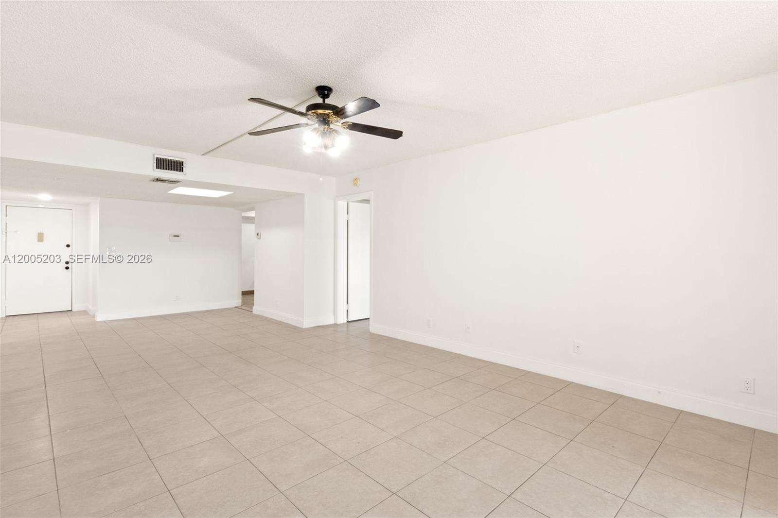 16400 Golf Club Road, Unit 104 Weston, FL 33326 - Photo 10 of 34 a view of an empty room