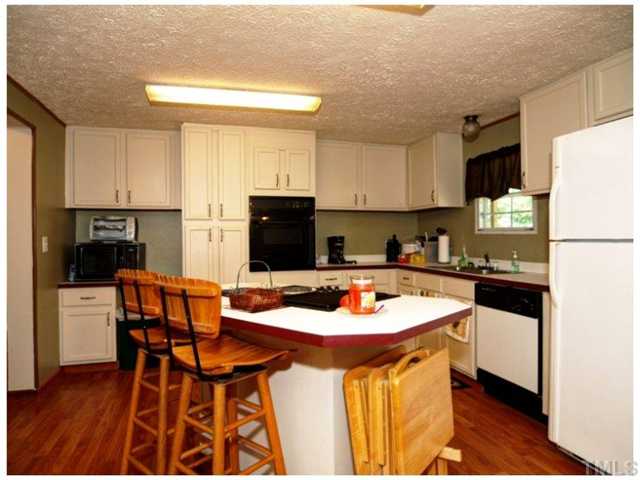 1405 Yakimas Road Raleigh, NC 27603 - Photo 6 of 16 Very open kitchen