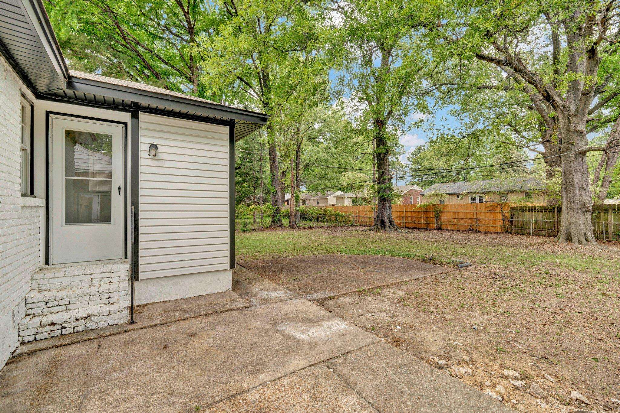 1866 Cherry Road Memphis, TN 38117 - Photo 18 of 20 a view of a house with a yard