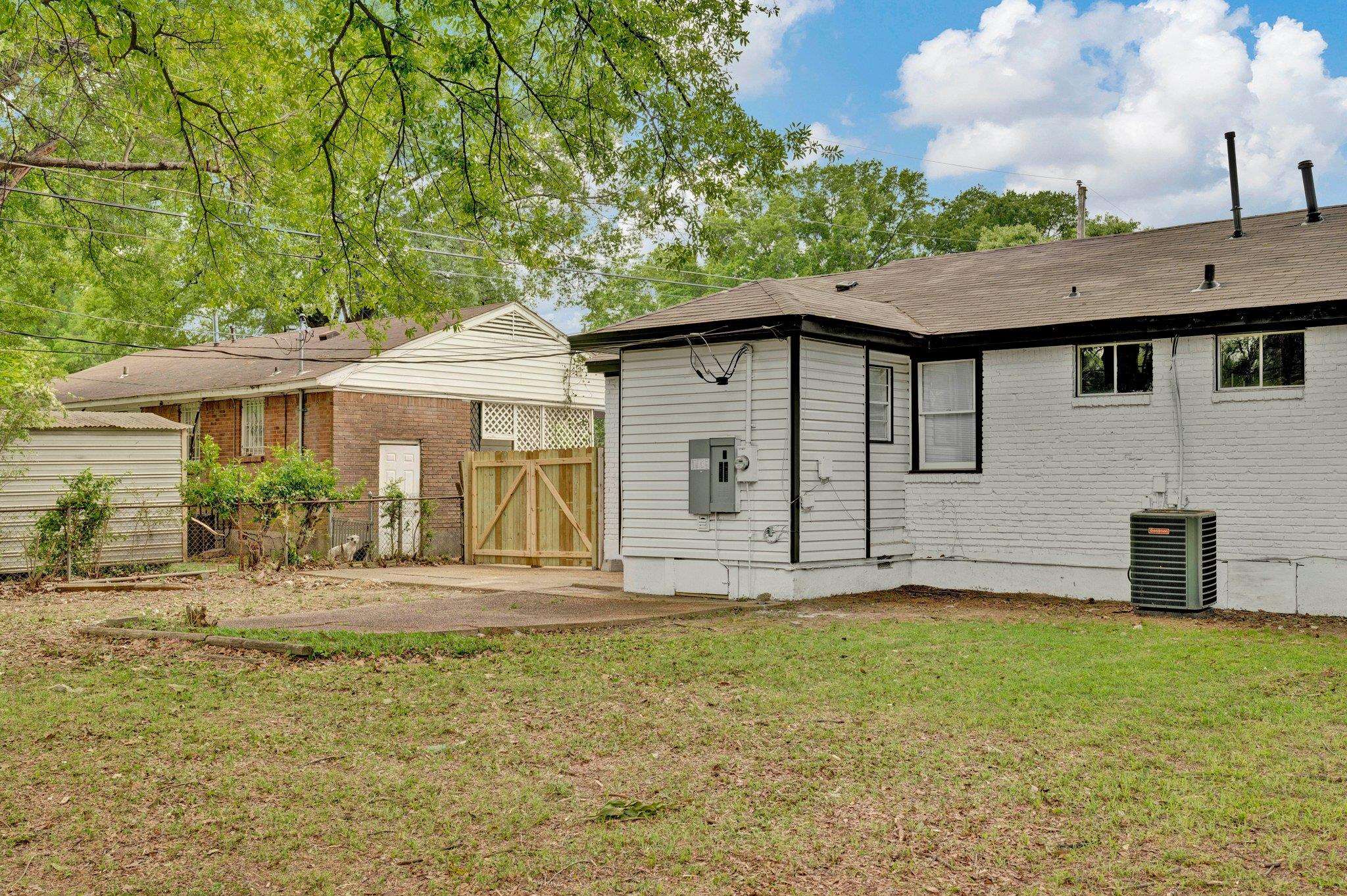1866 Cherry Road Memphis, TN 38117 - Photo 19 of 20 a front view of a house with garden