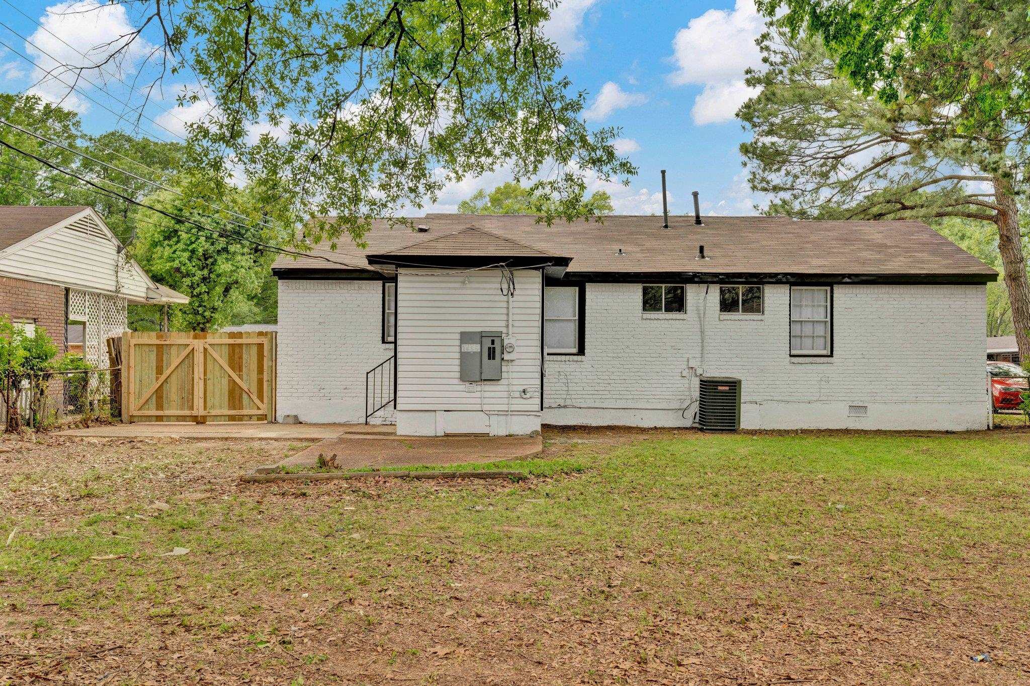 1866 Cherry Road Memphis, TN 38117 - Photo 20 of 20 a house that has a tree in front of it
