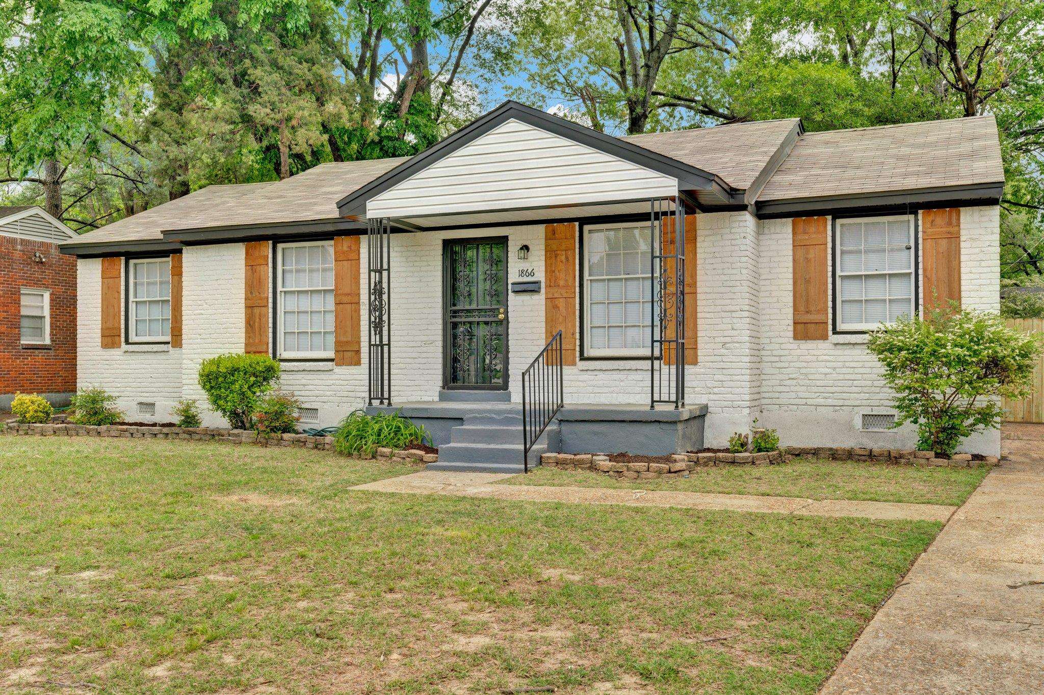 1866 Cherry Road Memphis, TN 38117 - Photo 2 of 20 a view of a house with backyard and garden