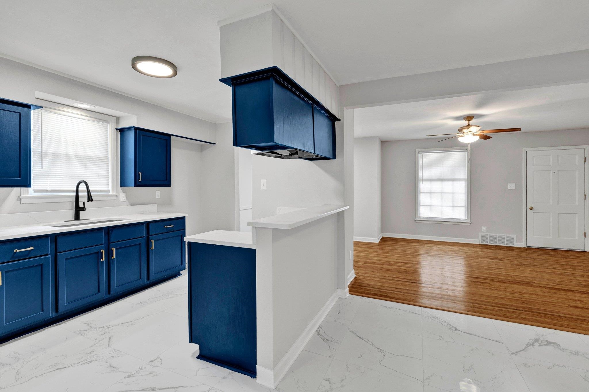 1866 Cherry Road Memphis, TN 38117 - Photo 5 of 20 a kitchen with stainless steel appliances granite countertop a sink and cabinets