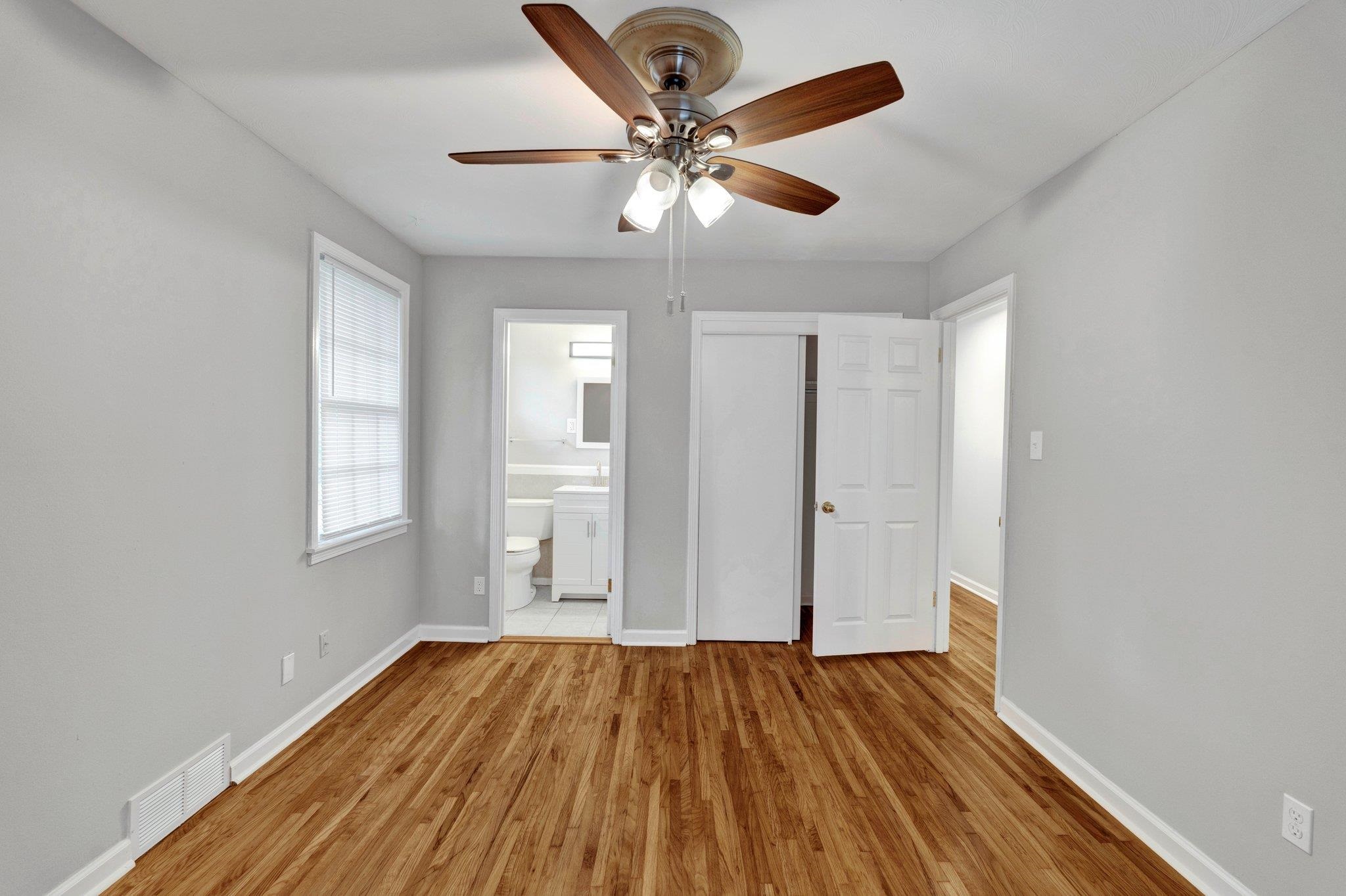 1866 Cherry Road Memphis, TN 38117 - Photo 10 of 20 a view of empty room with wooden floor
