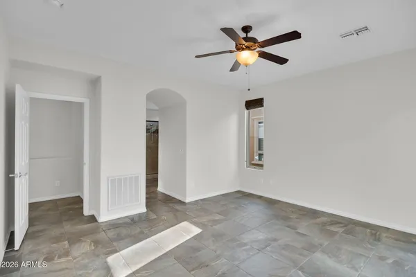 a view of livingroom with ceiling fan
