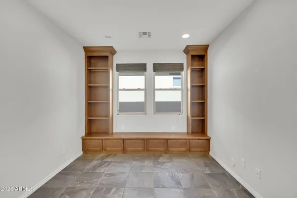 a view of room with window and hardwood floor
