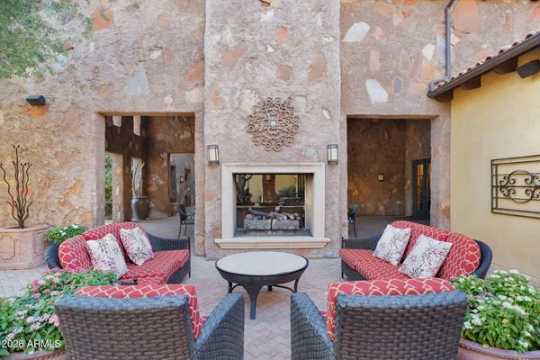 a view of a swimming pool with a patio