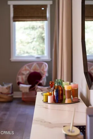 a view of a chairs and table in backyard