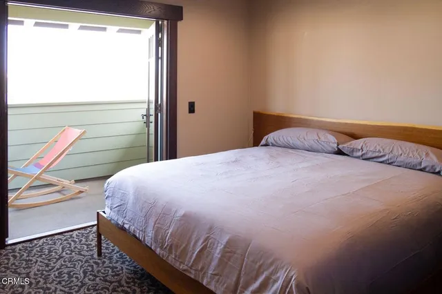 a living room with furniture and window