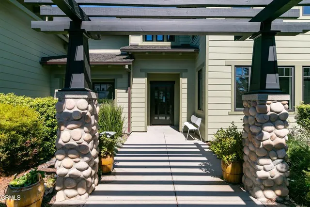 a bathroom with a granite countertop sink a toilet and a bathtub