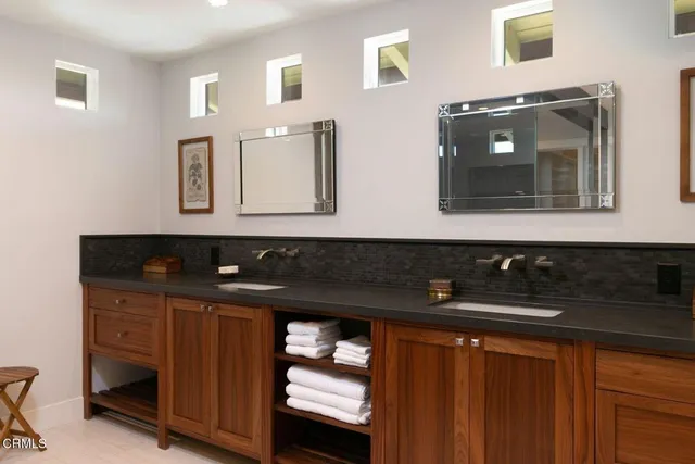 a view of livingroom with furniture and workspace