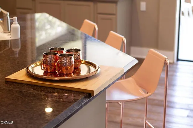 a view of dining table and chairs