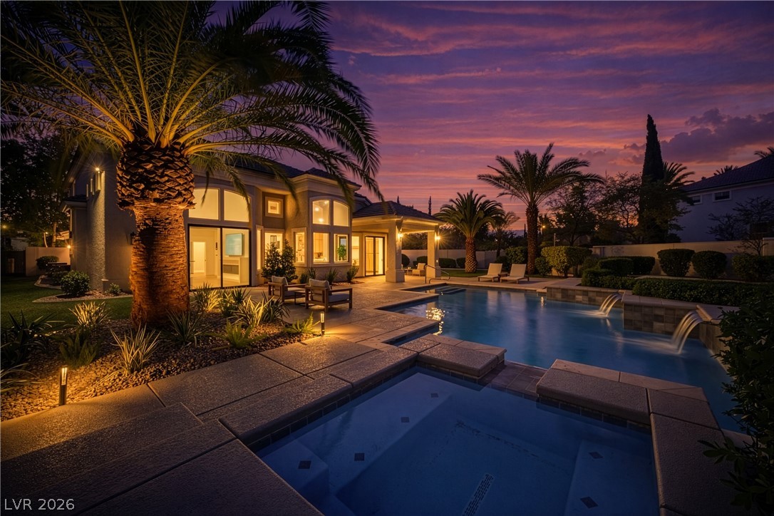 8800 Lusso Las Vegas, NV 89134 - Photo 2 of 85 Relaxing pool / spa featuring a patio and outdoor lounge area