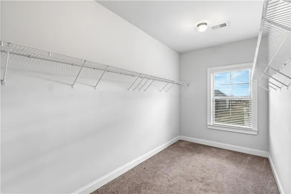 a view of a room that has a window in it