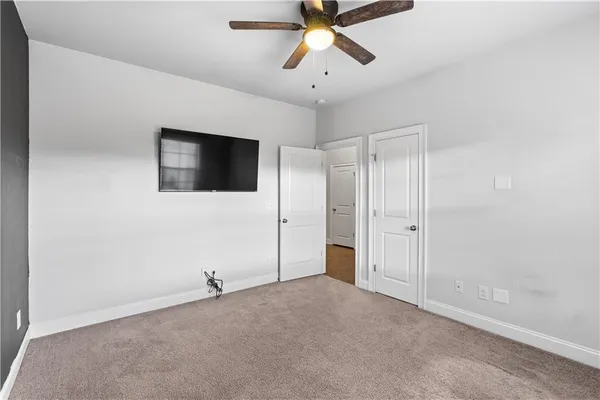 a view of a livingroom with a flat screen tv
